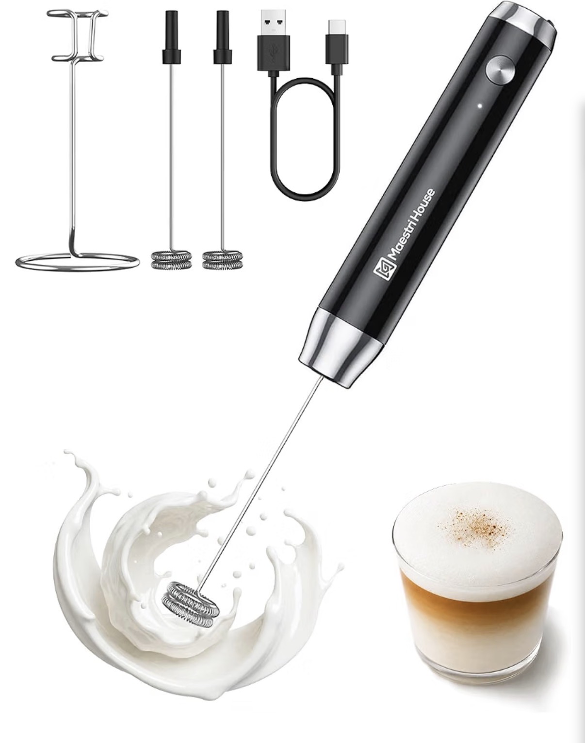 Black handheld electric milk frother on a stainless stand beside a latte with foam