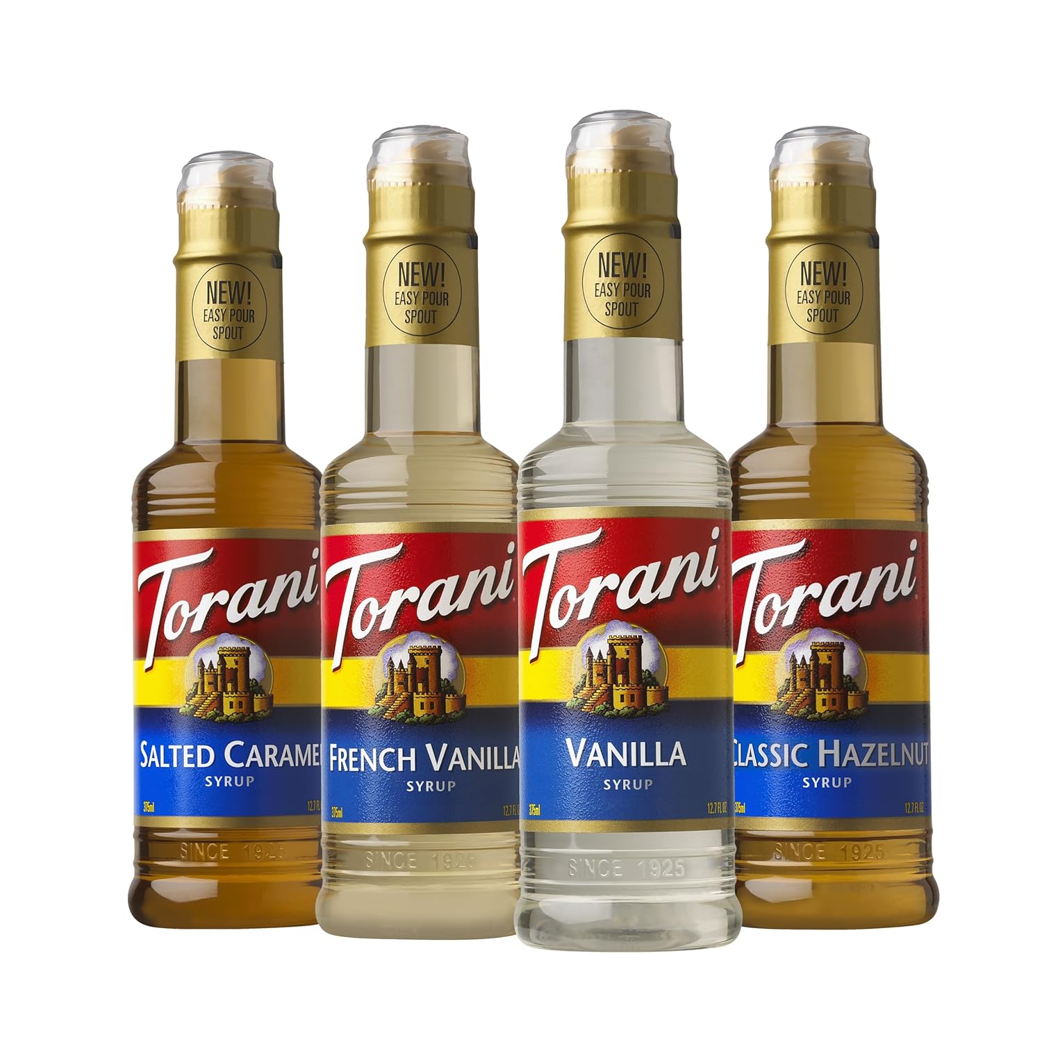 Set of four flavored coffee syrup bottles in vanilla, salted caramel, hazelnut, and French vanilla